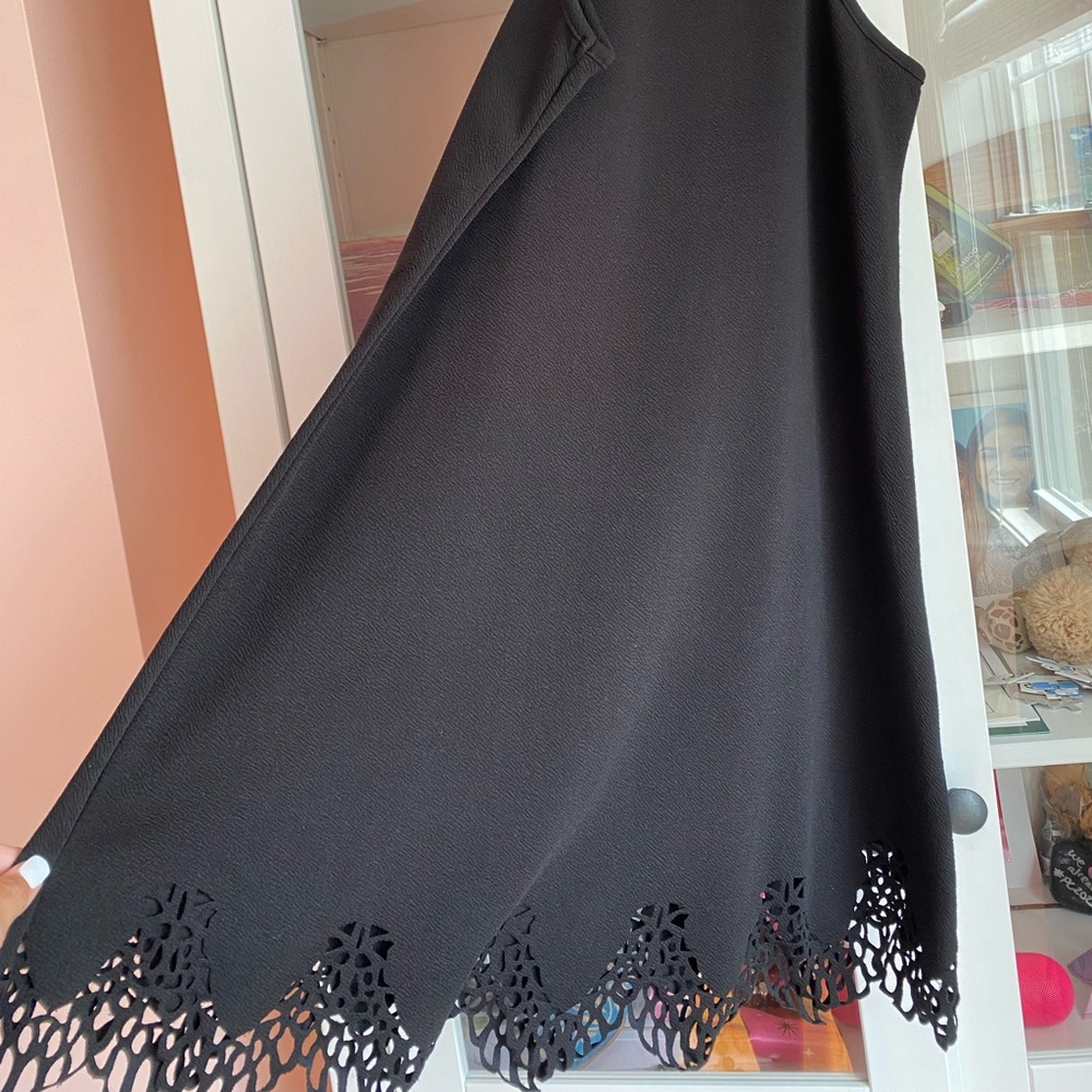 NEVER WORN Black dress with cutout pattern bottom